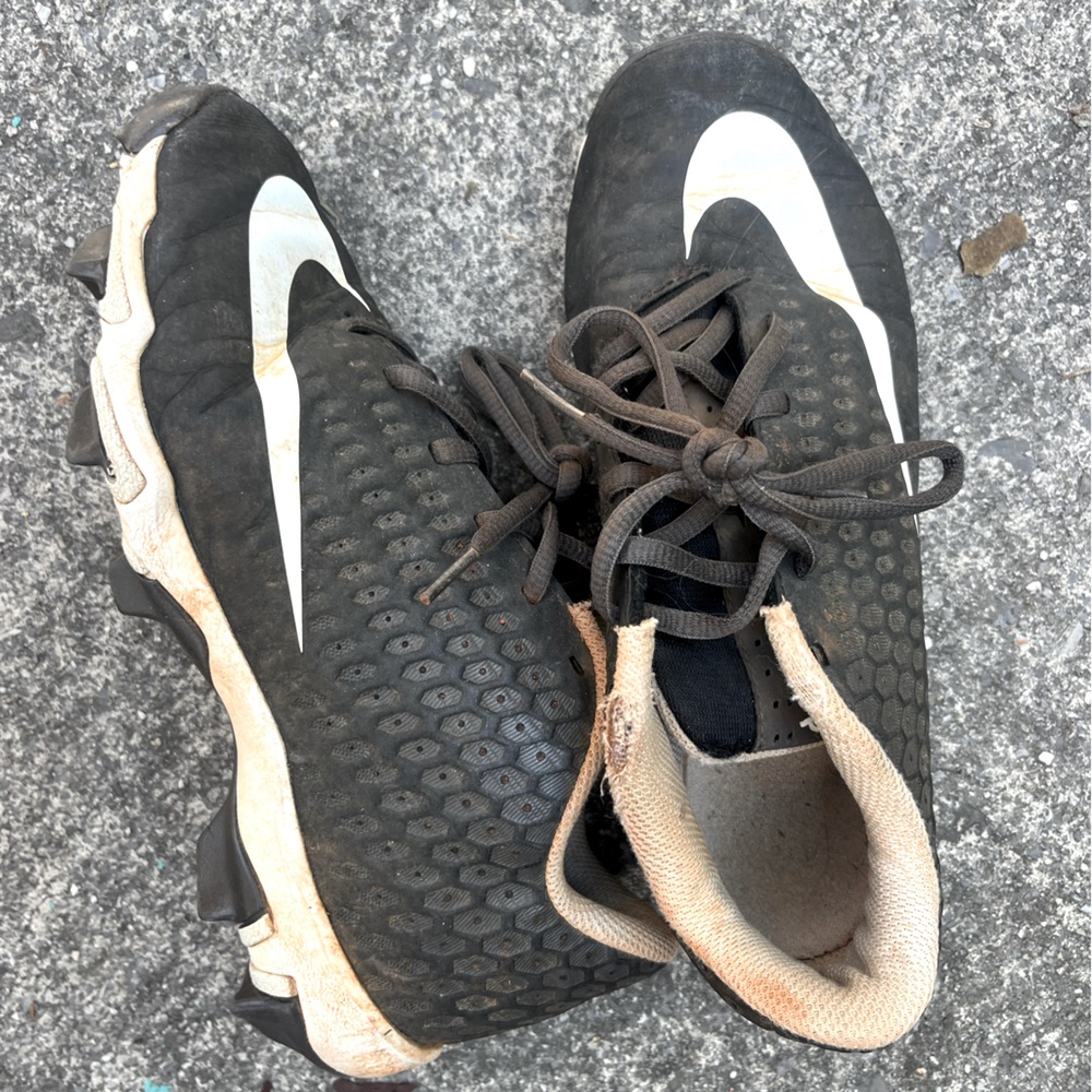 Nike cleats. Big kid size 5. Loved but good condition.